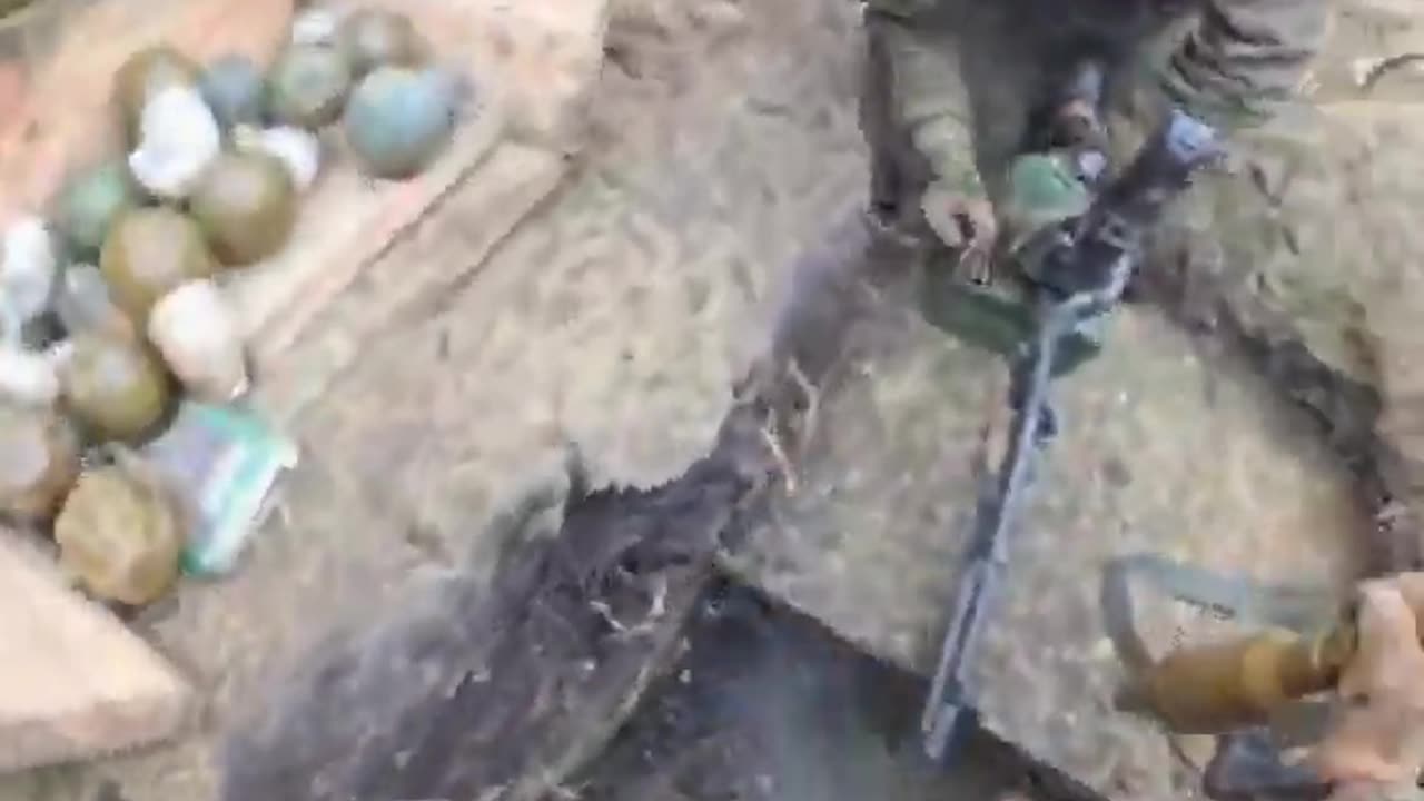 Ukrainian soldiers defending their position from an enemy assault.