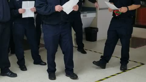 Local Firefighters sing to patient at a dialysis patients