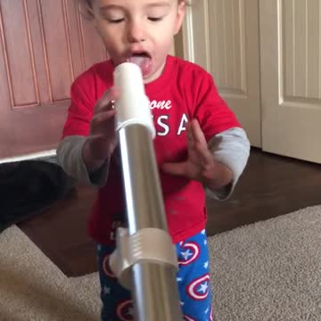 Baby Sticks Tongue in Vacuum Cleaner