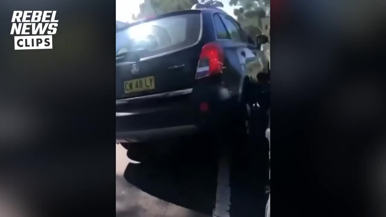 Crazy Australian Woman Intentionally Rams Vehicle Into Freedom Protester's Car