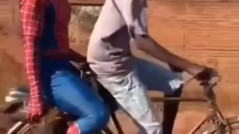 Spiderman stealing a chicken