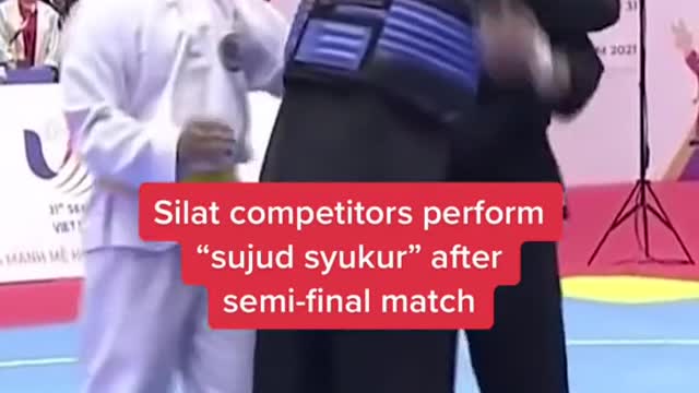 Silat competitors perform"sujud syukur" aftersemi-final match