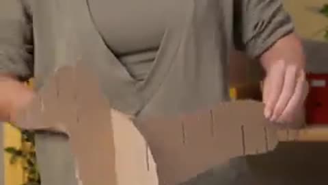 Cardboard dog to store painting tool