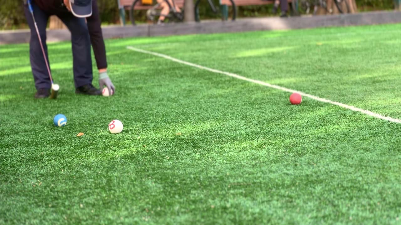 a man who plays gateball in the park