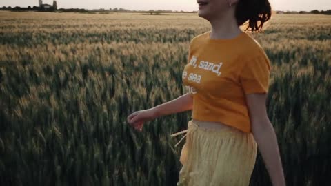 A girl playing with nature in a beautiful moment.