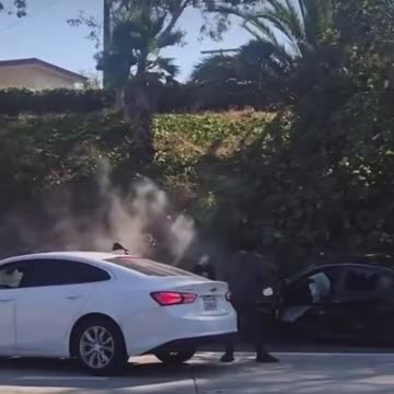 Armed thugs pull over and rob a man who just got in a car accident__