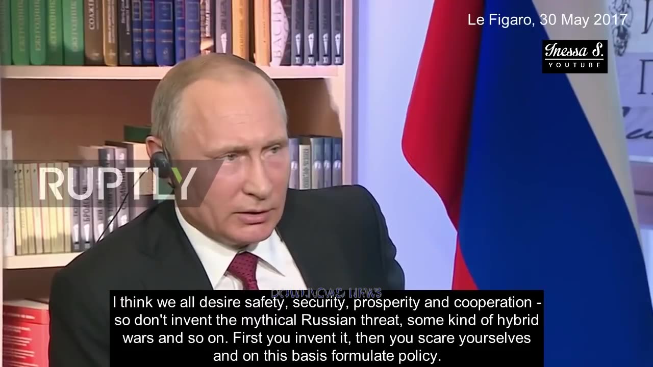 Putin: Men In Dark Suits Rule America