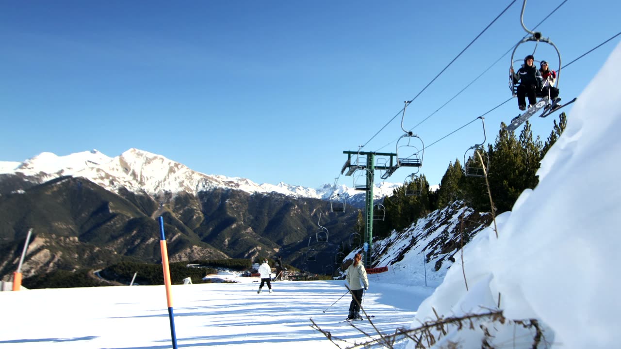 People skiing on the mountain.