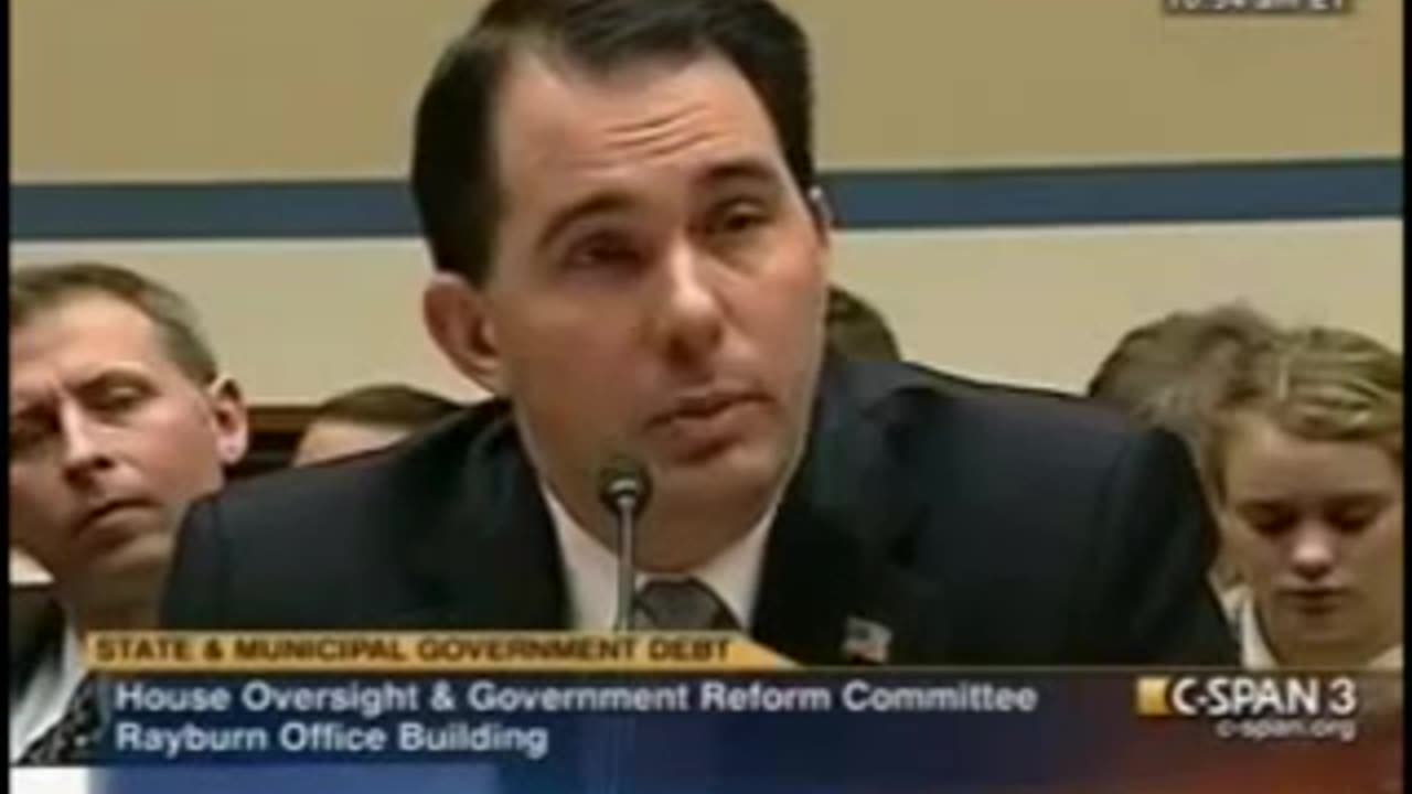 Scott Walker and Dennis Kucinich (2011)