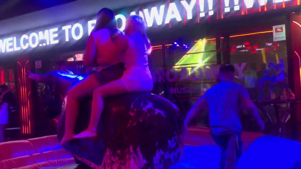 GIRL TAKE ON THE BULL! Benidorm Bull Ride. Mechanical Bull EPIC FAIL