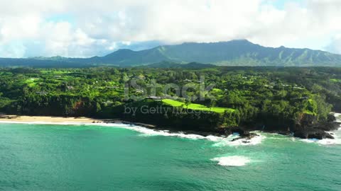 Kauai Hawaii Bright Aqua Blue Ocean Swells Lush Mountains Aerial Rainforest Jungle Landscape s