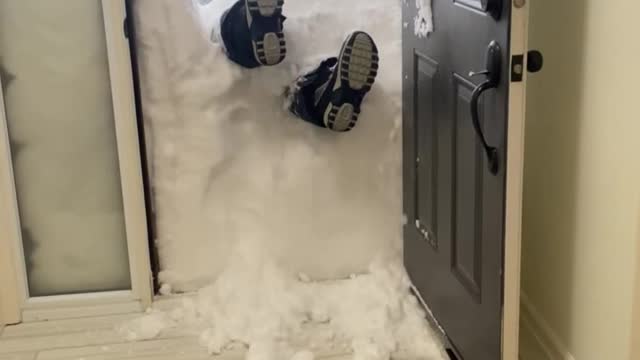 Jumping Through a Wall of Snow at the Door