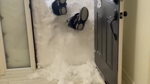 Jumping Through a Wall of Snow at the Door