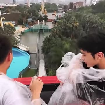 Ripping each other’s raincoats in water roller coaster!