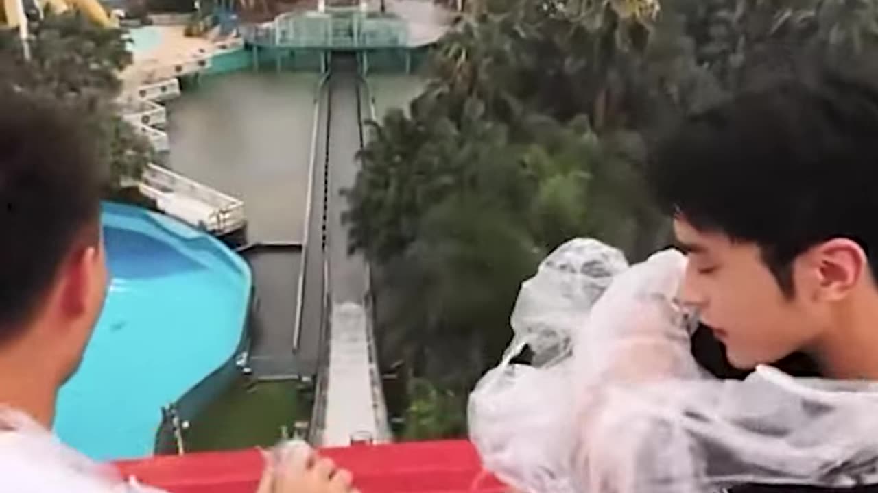 Ripping each other’s raincoats in water roller coaster!