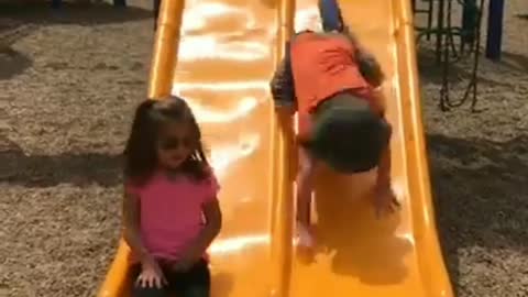 Funny video of kids sliding off the slider.