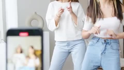 two girls dance caption