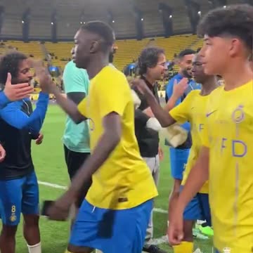 Ronaldo applauded Ronaldo Jr onto the pitch after Al-Nassr U13's were crowned champions