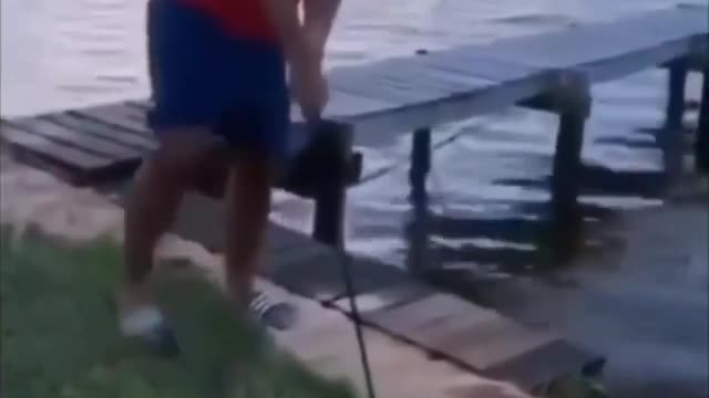 Funny street golfer missed his shot and drop down into lake