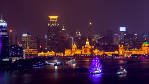 Illuminated buildings in the Shanghai river