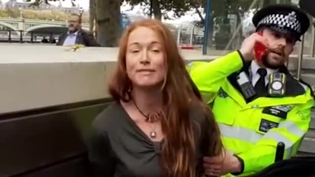 Climate protester vandalizing with paint
