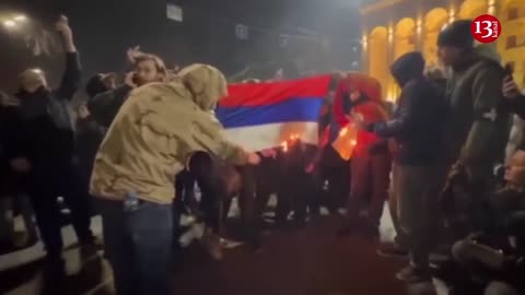 Protesters in Georgia burn Russian flag