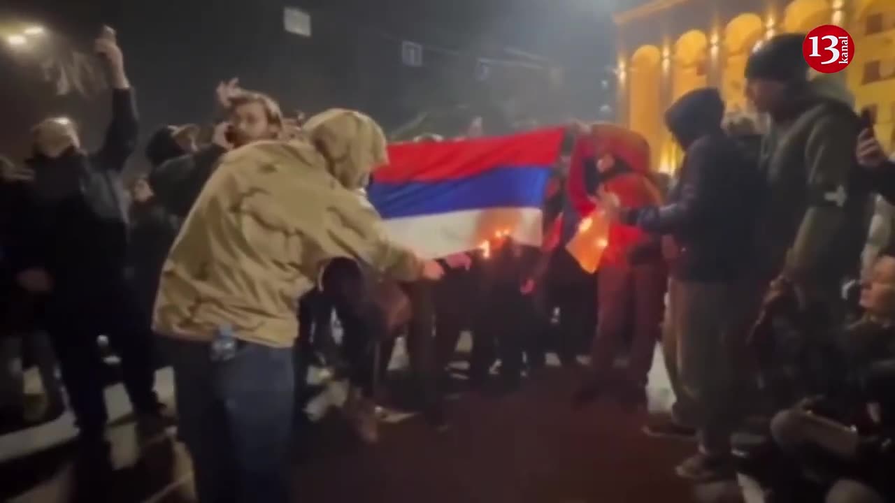 Protesters in Georgia burn Russian flag