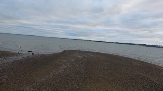 Panning away from the sea .