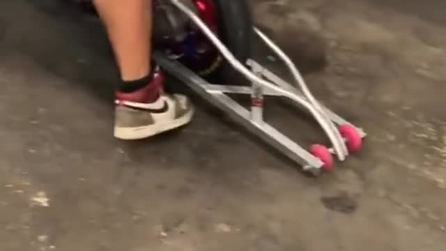 Car repairers design and make scooters.