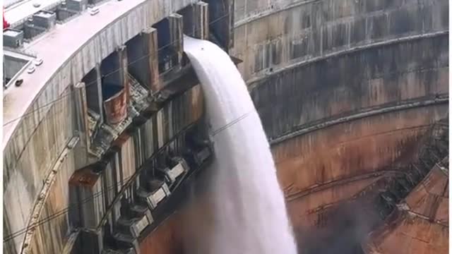 HNDROELECTRIC DAM DISCHARGES WATER