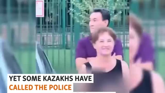 Kazakhs Confront Russian Tourists Over 'Z' Stickers On Cars