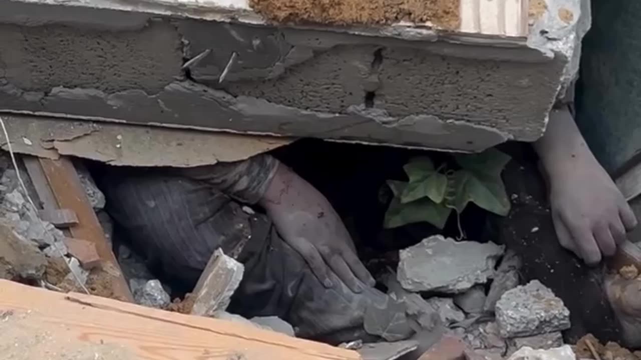 The body of a girl that is still under the rubble of a destroyed home in Gaza for the 4th day.