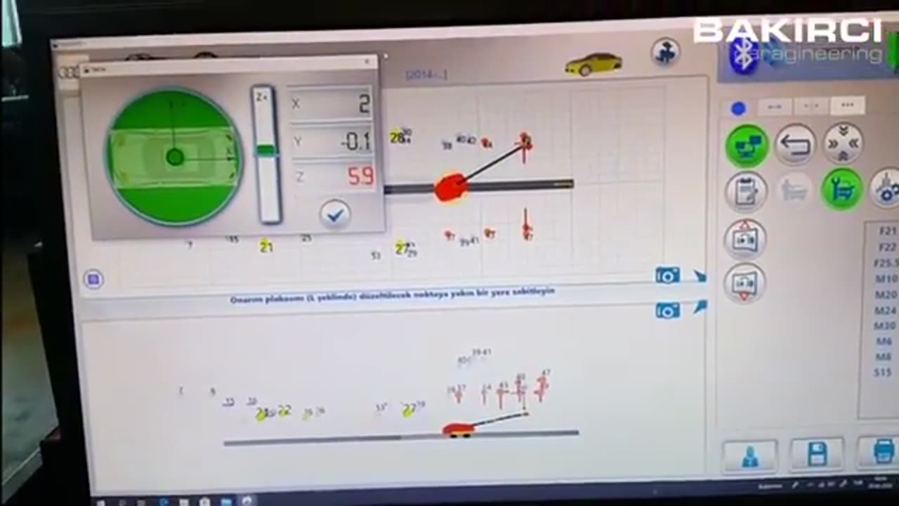 Celette Naja 3D measuring system used during car frame straightening process on a Celette car bench