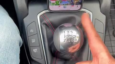 Automobile gear shift lever shifting