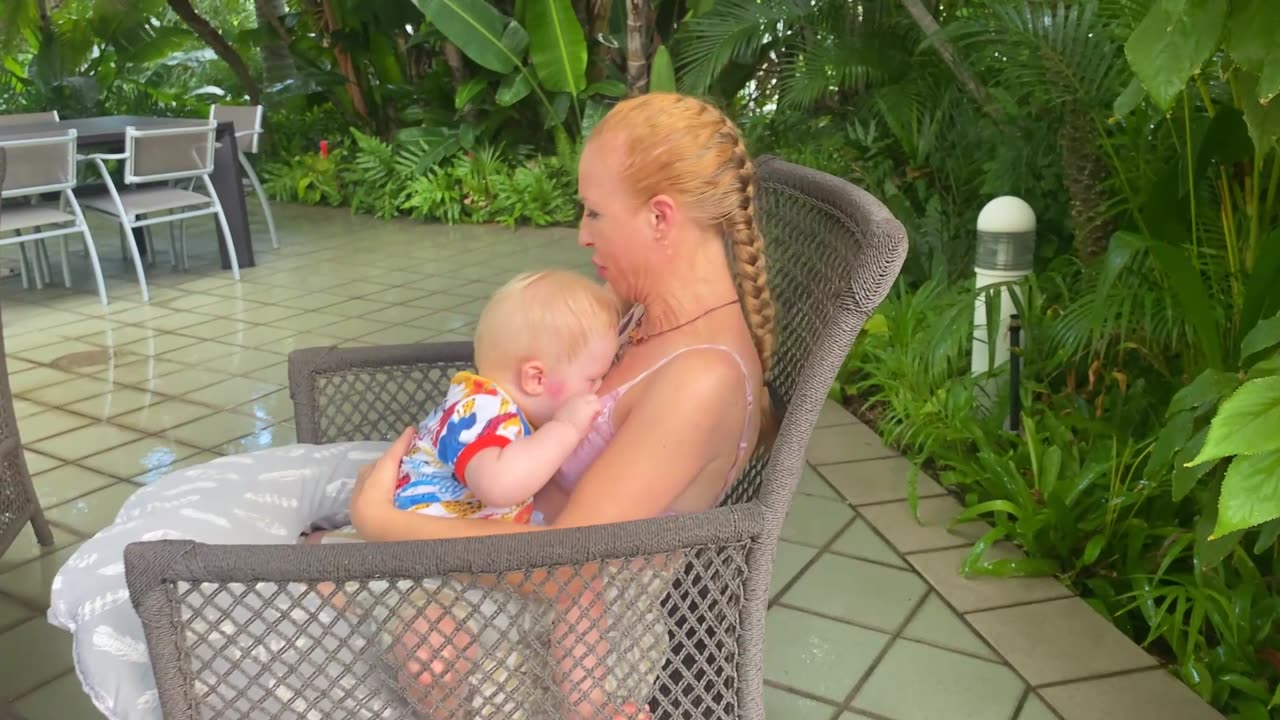 BREASTFEEDING IN THE GARDEN AFTER A TROPICAL RAIN SHOWER//