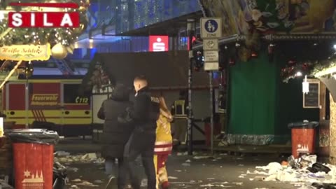 Terror attack in Germany as video shows BMW driving through Christmas market leaving 'at least one dead and up to 80 injured'