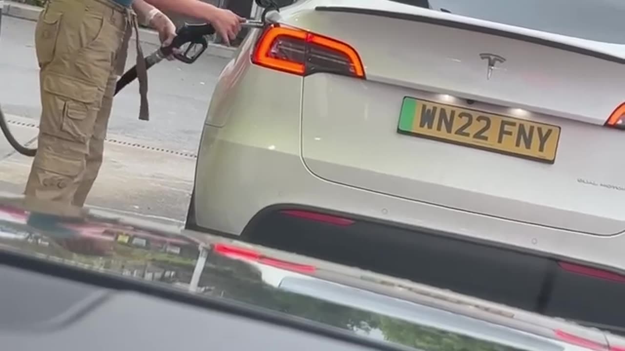 Where is hole for fuel in Tesla models?