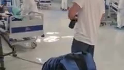 Setting up fake pandemic footage in Israel. (1 min 2 seconds)