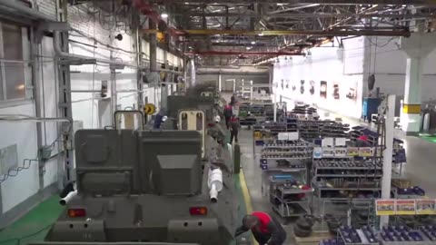 Russian general Shoigu visits a combat vehicle factory in Nizhny Novgorod