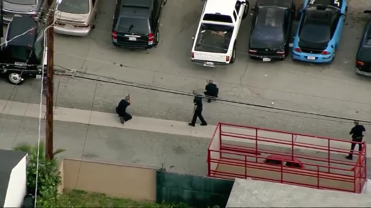 Suspect in LA police pursuit runs, hides under car