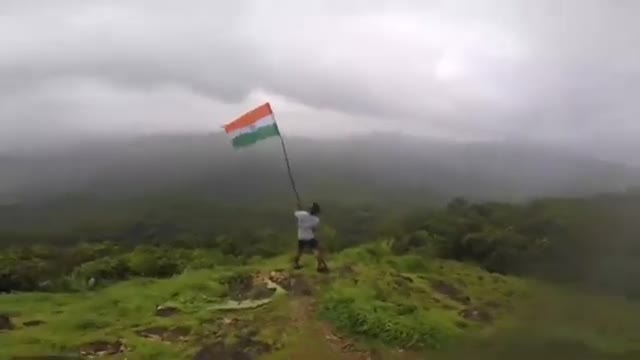 Guy Waves Indian Tricolor on Hilltop to Celebrate Republic Day