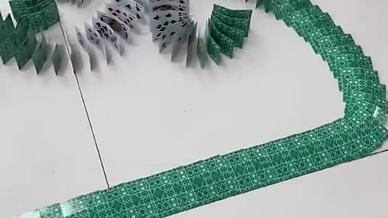 Watch This Mesmerizing Card Domino Effect!