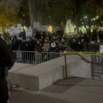 Far-left protesters chant outside a Charlie Kirk event at the University of New Mexico