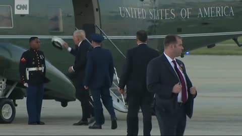 Trump stops to retrieve Marine’s hat