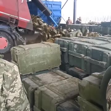 Ukrainian military delicately unload TM-62M anti-tank mine