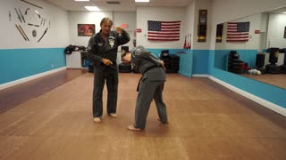 Correcting common errors executing the American Kenpo technique Glancing Wing