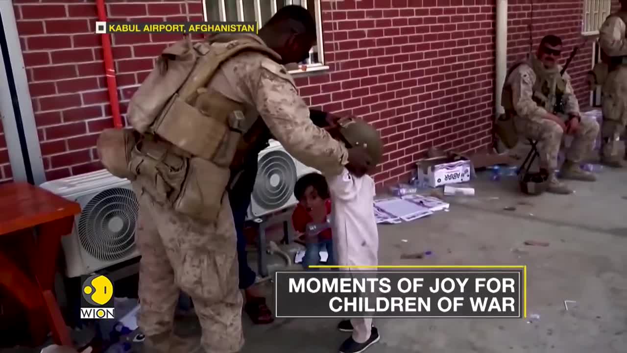 Afghanistan: soldiers share some lighter moment with children