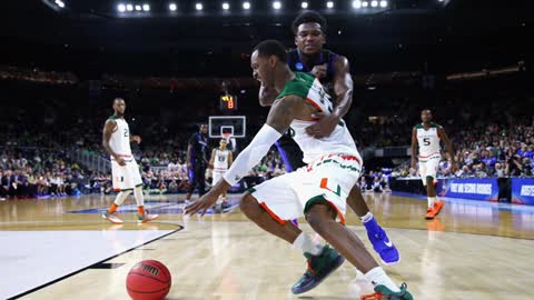 Teammates John Wall and Sheldon Mcclellan Faceoff During Practice