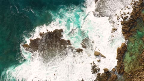 Waves Striking The Rocks