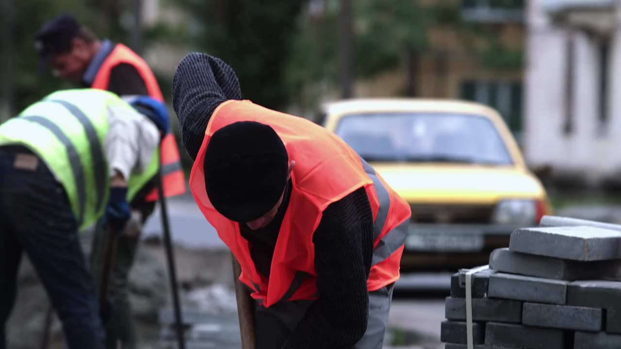 Hard-working wokers ready to build a street